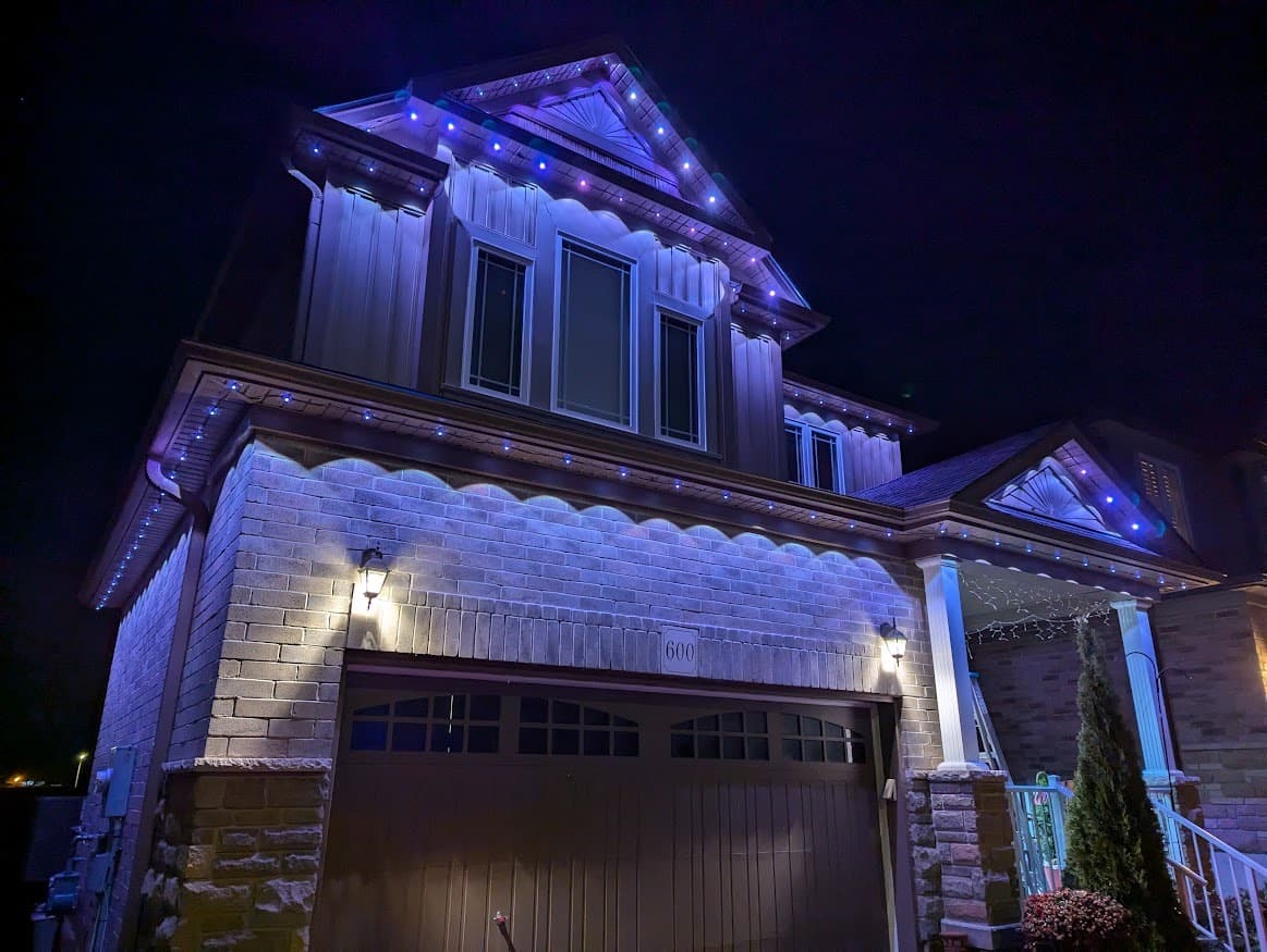 Govee LED outdoor lighting installed on home - vibrant colours at night