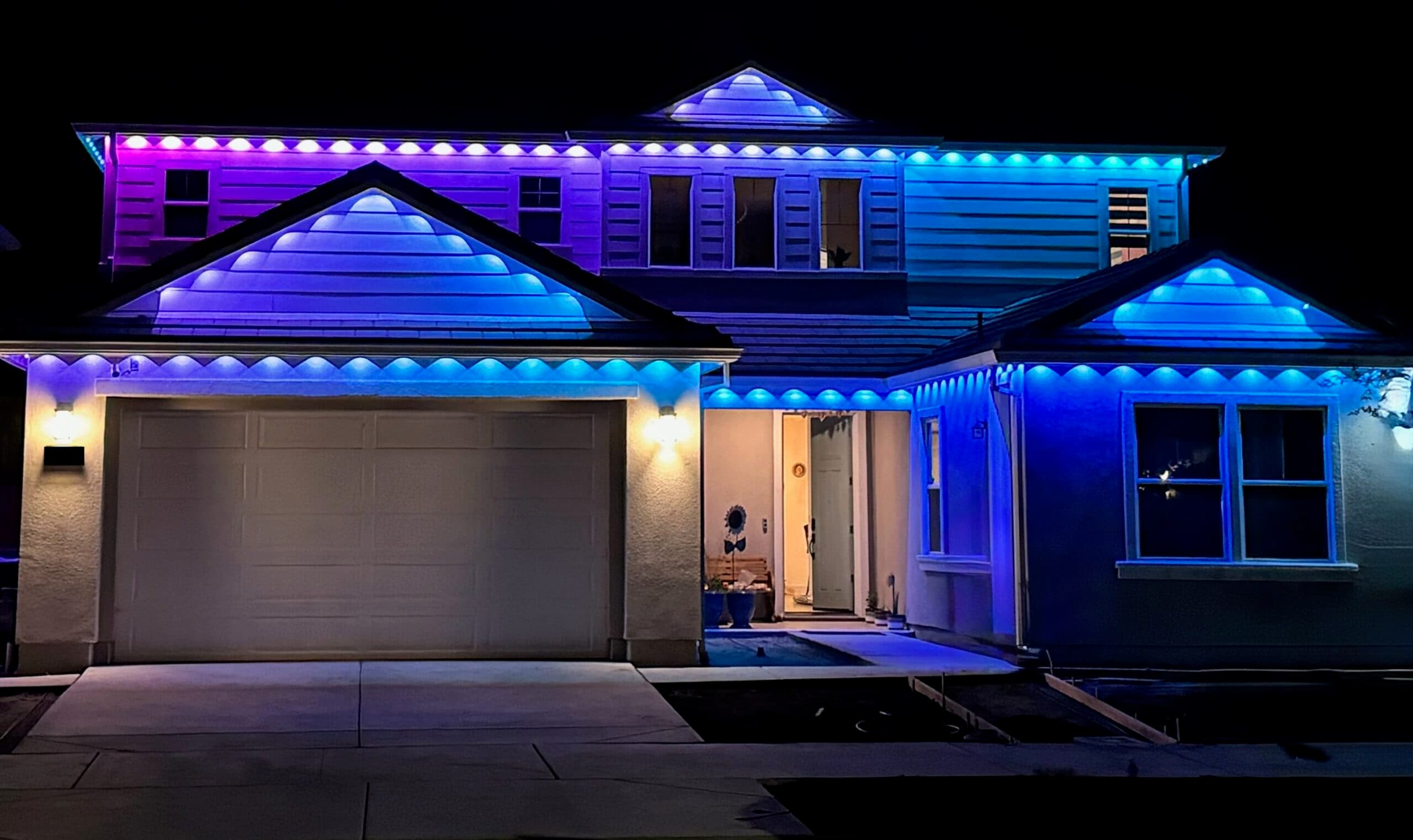 Govee LED roofline lighting with gradient colour effect on Ontario home